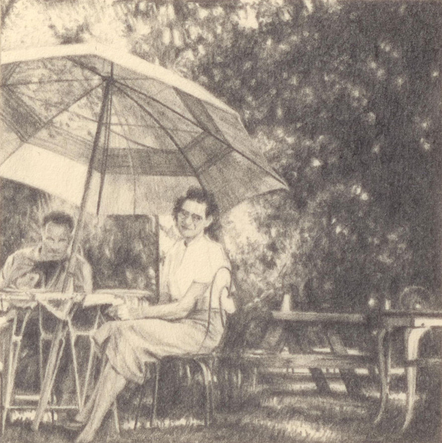 A Woman and Man at a Table Outside