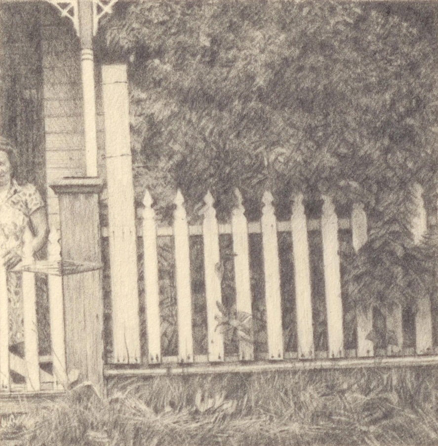 A Woman Standing in Front of a House